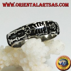 Silver record ring with integral high relief skeleton