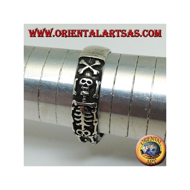 Silver record ring with integral high relief skeleton
