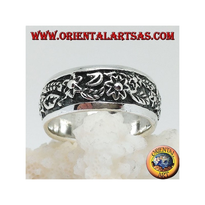 Ring in silver with continuous floral decoration in high relief