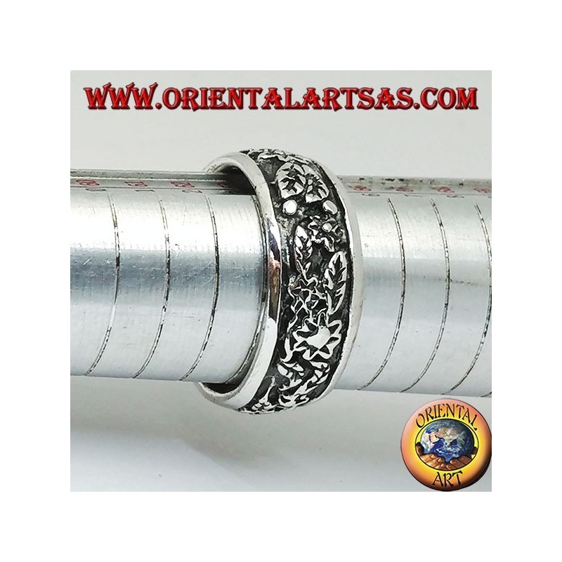 Ring in silver with continuous floral decoration in high relief