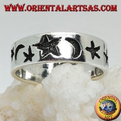 Smooth silver ring with thick engravings of stars and moons