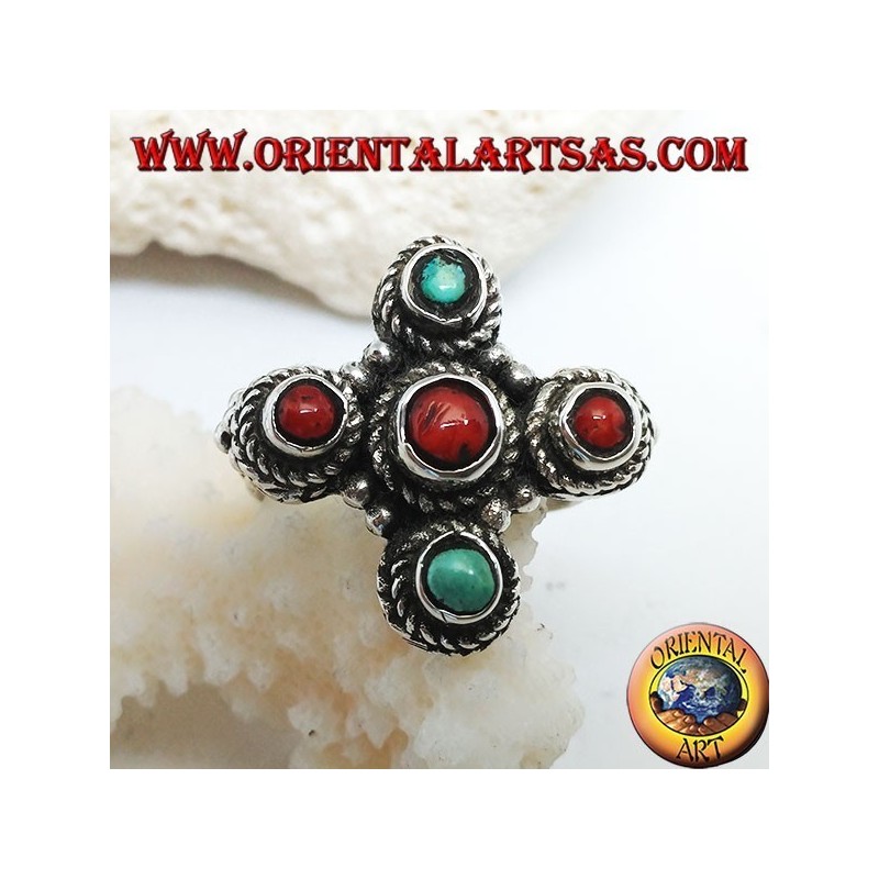 Anillo de plata con tres corales y dos turquesas naturales de origen tibetano dispuestas en una cruz griega.