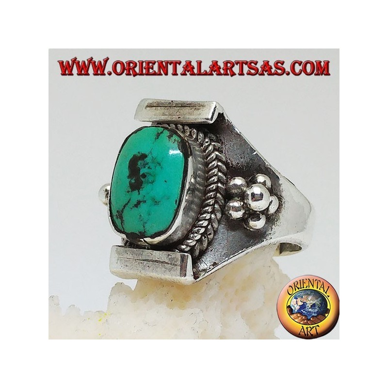 Silver ring with Tibetan antique turquoise on a Nepalese setting and balls on the sides