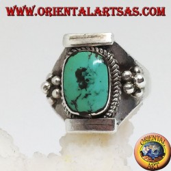 Silver ring with Tibetan antique turquoise on a Nepalese setting and balls on the sides