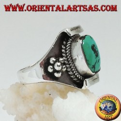Silver ring with Tibetan antique turquoise on a Nepalese setting and balls on the sides