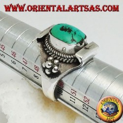 Silver ring with Tibetan antique turquoise on a Nepalese setting and balls on the sides