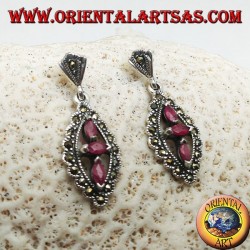 Silver earrings with three natural oval rubies in a marcasite rhombus