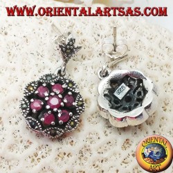 Pendientes de plata con círculos triples concéntricos de rubíes redondos naturales engastados y marcasita lanzadera.