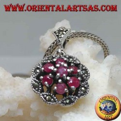 Silver pendant with triple concentric circles of natural round rubies set and shuttle marcasite