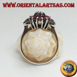 Silver ring with natural round ruby set with three rubies above and below and marcasite on the sides