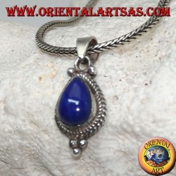 Silver pendant with a lapis lazuli drop cabochon surrounded by intertwining and three balls below