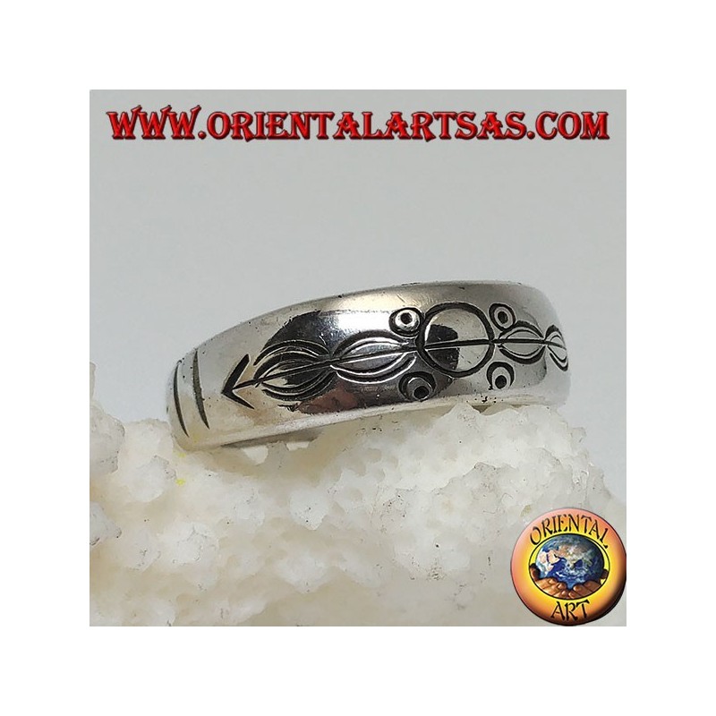 Silver ring with ring engraved circles and ovals impaled by an arrow