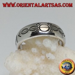 Silver ring with ring engraved circles and ovals impaled by an arrow