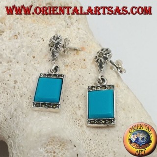 Pendientes de plata con turquesa rectangular y una hilera de piedras de marcasita arriba y abajo.