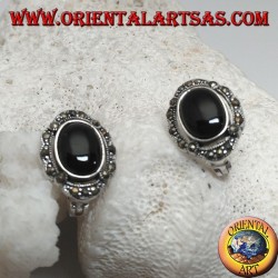 Silver lobe earrings with oval onyx surrounded by marcasite and lever closure
