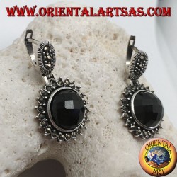 Silver earrings with faceted round onyx surrounded by marcasite and lever closure