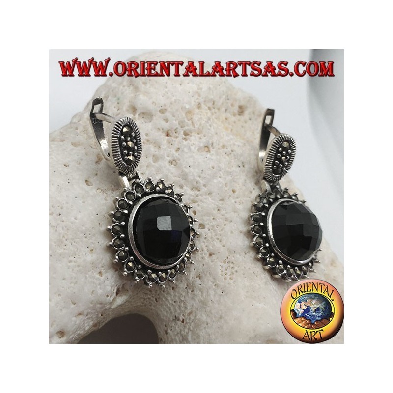 Silver earrings with faceted round onyx surrounded by marcasite and lever closure
