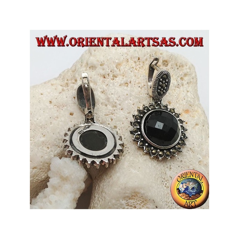 Silver earrings with faceted round onyx surrounded by marcasite and lever closure