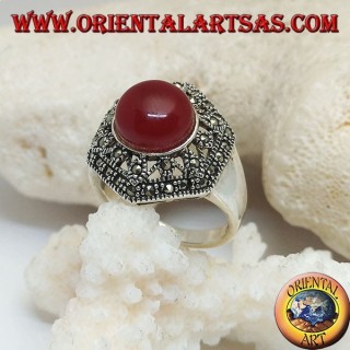 Silver ring with round cabochon carnelian on a decorated perforated hexagon studded with marcasite