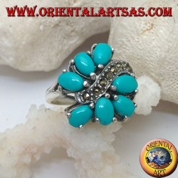 Silver ring with 7 oval turquoise set, divided by a marcasite wave line