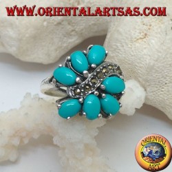 Anillo de plata con 7 conjuntos ovales de turquesa, dividido por una línea de onda de marcasita