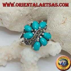 Silberring mit 7 ovalen Türkissätzen, geteilt durch eine Markasitwellenlinie