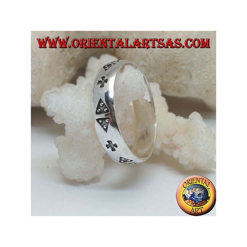 Silver ring with a pair of triangles and cross engraved in bas-relief