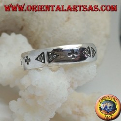Silver ring with a pair of triangles and cross engraved in bas-relief
