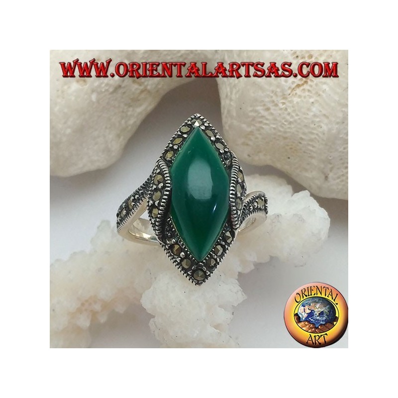 Silver ring with green cabochon shuttle agate surrounded by marcasite and rise on the sides