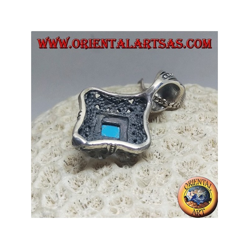 Rhomboid silver pendant with turquoise on a perforated rounded frame