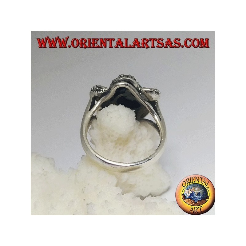 Silver ring with natural oval emerald set wrapped in 3D by threads with maracssite