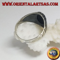 Silver ring with oval cabochon onyx set with ribbed setting