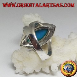 Silver ring, with turquoise cabochon cut shuttle surrounded by marcasite