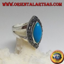 Silver ring, with turquoise cabochon cut shuttle surrounded by marcasite