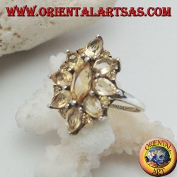 Silver oval flower ring formed by embedded shuttle citrine topazes