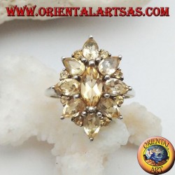 Silver oval flower ring formed by embedded shuttle citrine topazes
