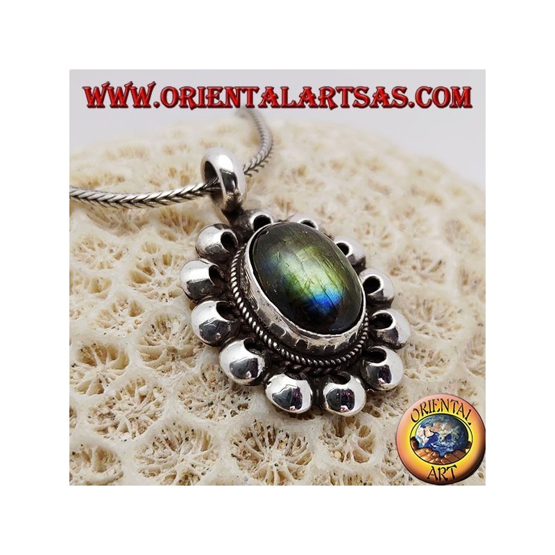 Silver pendant with oval fluorescent labradorite surrounded by perforated discs