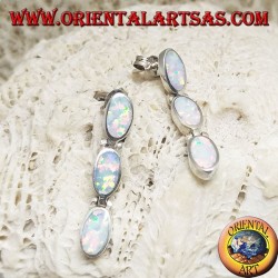 Silver lobe earrings with a row of three hanging oval white opals