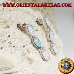 Silver lobe earrings with a row of three hanging oval white opals