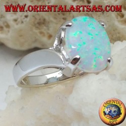 Silver ring with oval white opal set and curved frame on the sides