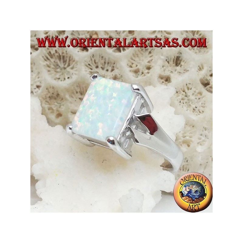 Silver ring with rectangular white opal set and V-shaped frame on the sides