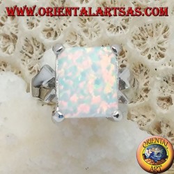Silver ring with rectangular white opal set and V-shaped frame on the sides