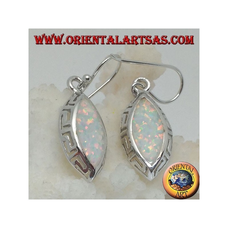 Silver earrings with white shuttle opal and openwork on the sides