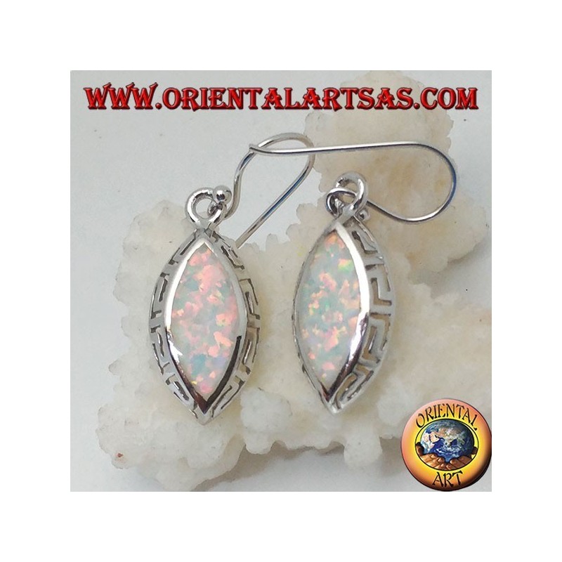 Silver earrings with white shuttle opal and openwork on the sides