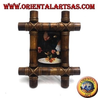 Marco de fotos en madera de teca y con inserción de cuatro cañas de bambú de 28x23 cm.