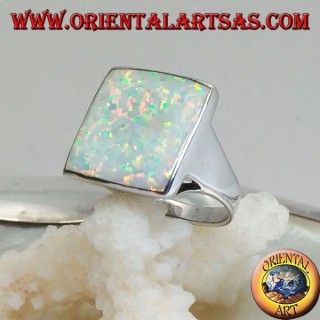 Silver ring with large square harlequin opal with openwork on the corners
