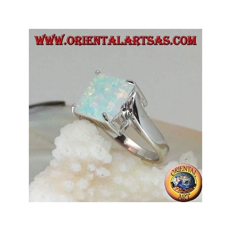 Silver ring with square harlequin opal set in four and asymmetrical setting