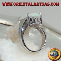 Silver ring with square harlequin opal set in four and asymmetrical setting