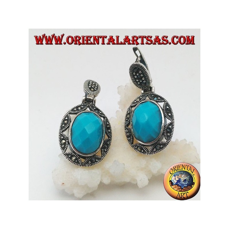 Boucles d'oreilles en argent avec cabochon ovale à facettes turquoise entourées d'une broderie d'étoiles et de marcassite