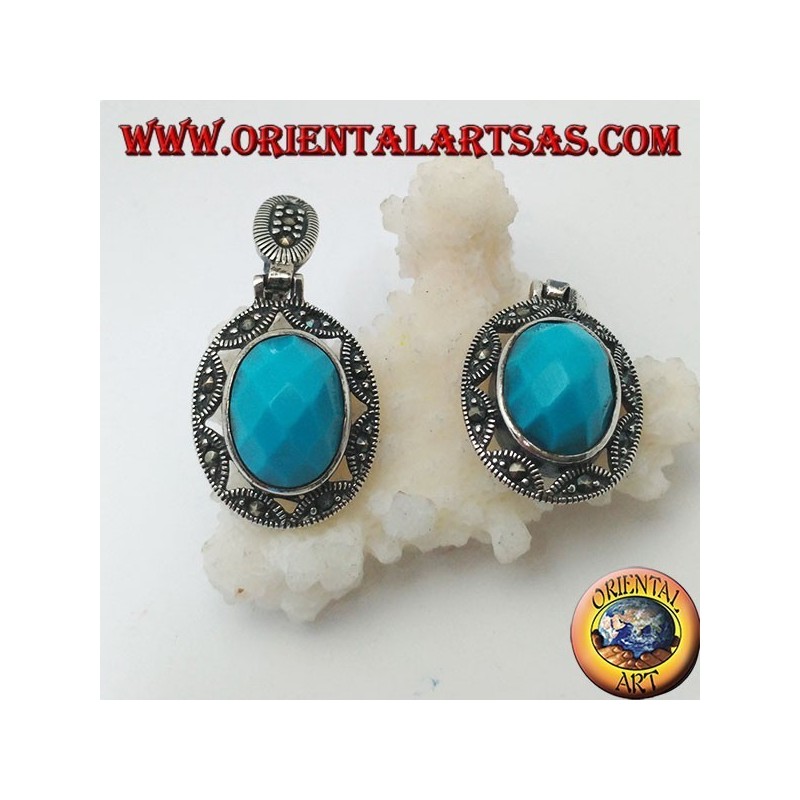 Silberne Ohrringe mit ovalem Cabochon mit türkisfarbenen Facetten, umgeben von einem Laubsägearbeiten aus Stern und Markasit